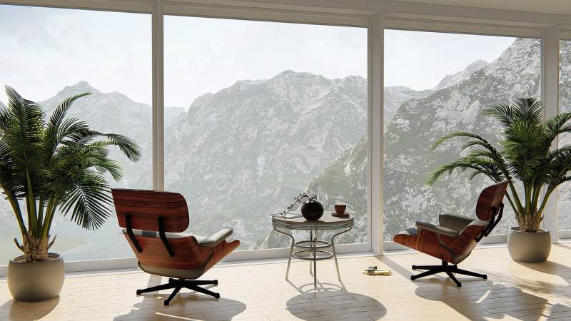 appartement design avec grande baie vitrée avec vue sur les montagnes annecy